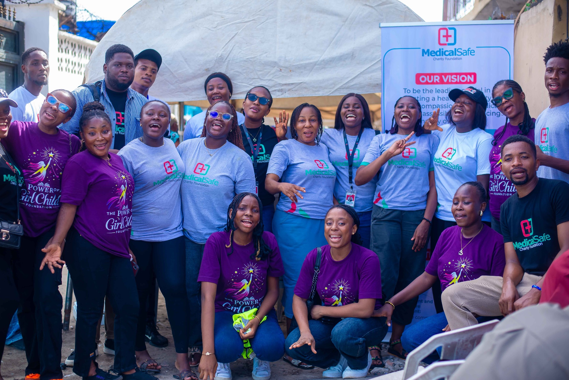 Volunteers cheering at community event